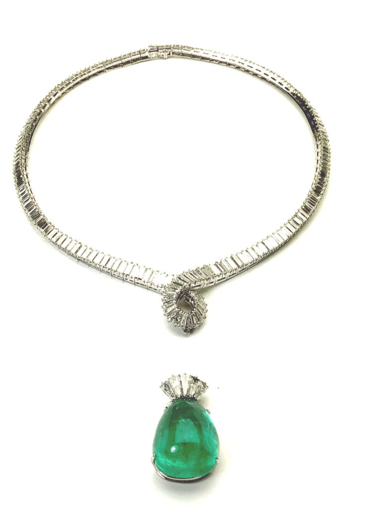 diamond necklace and emerald drop